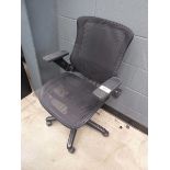 +VAT Black mesh swivel armchair