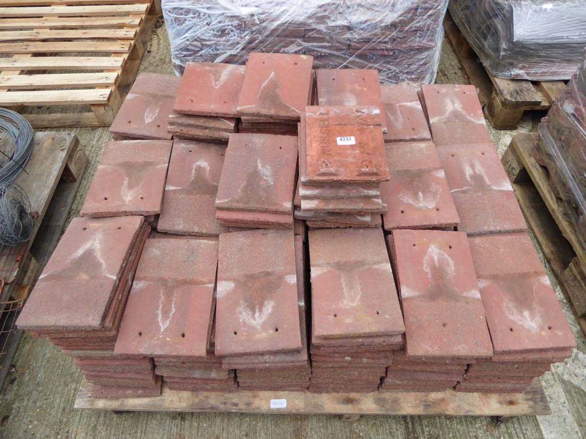 2 pallets of terracotta roofing tiles