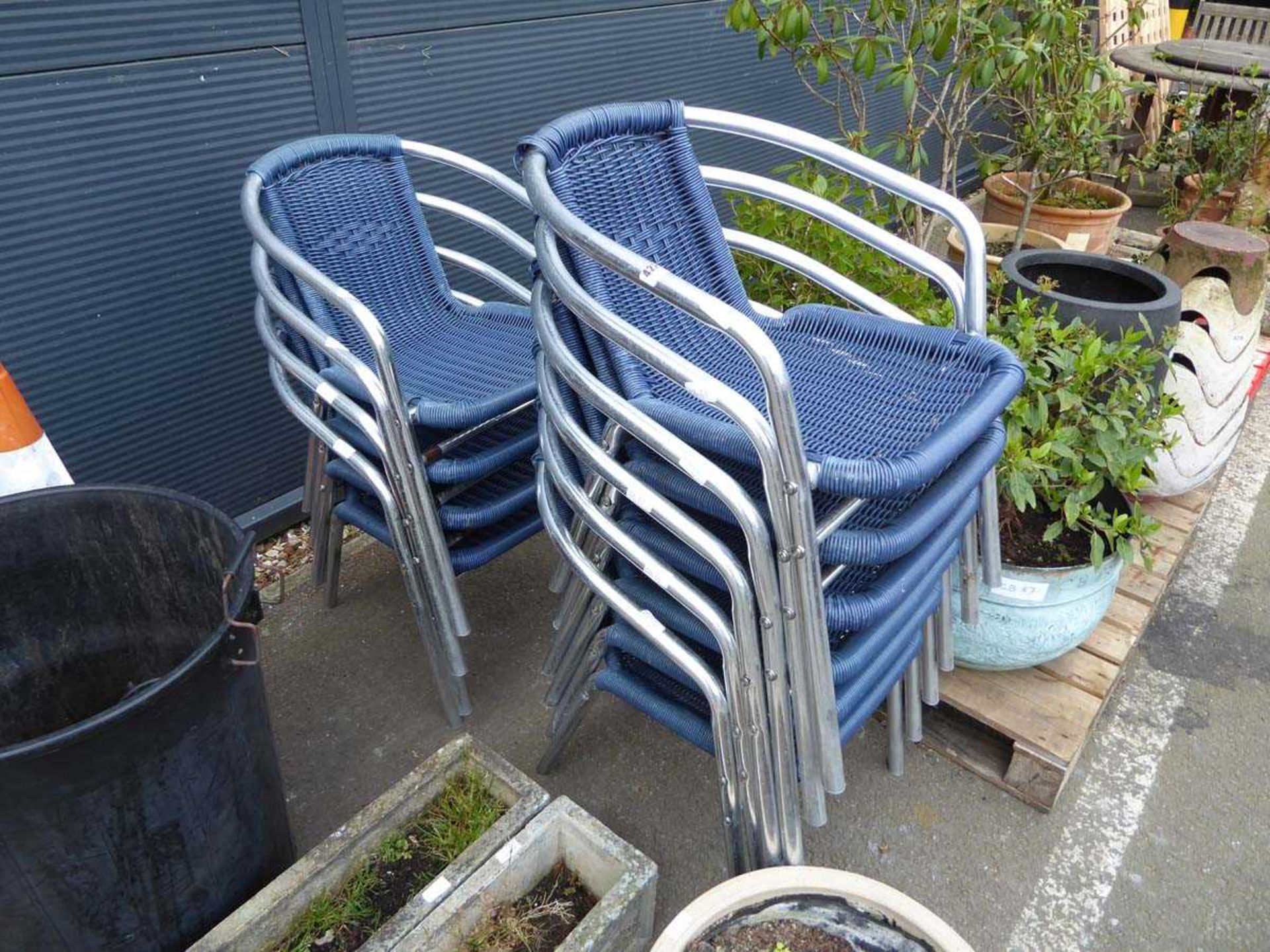 10 blue wicker style stacking chairs