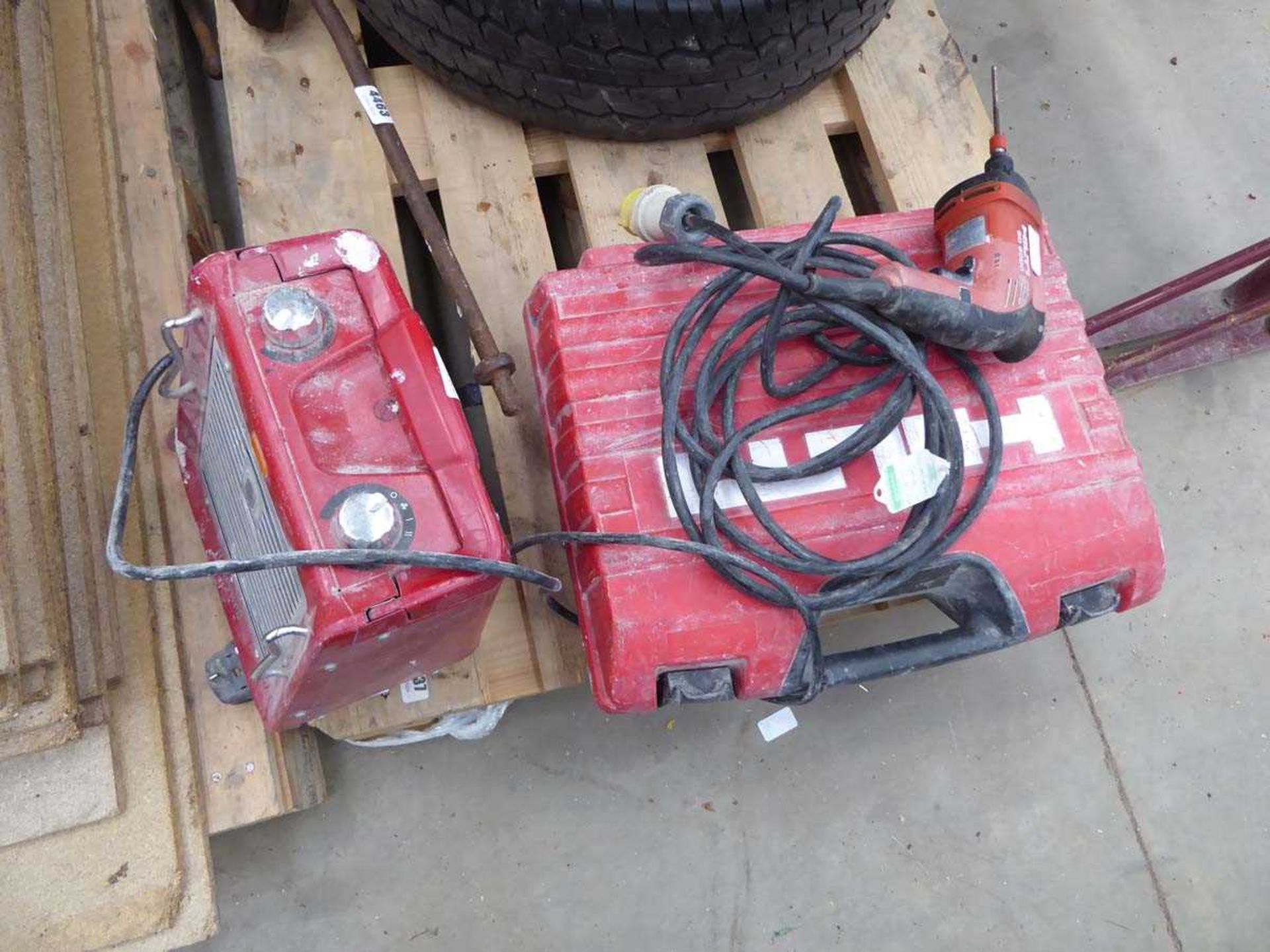 Hilti DX450, Hilti screwdriver, and small heater