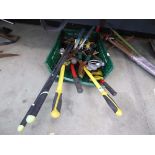 Small basket of assorted garden tools