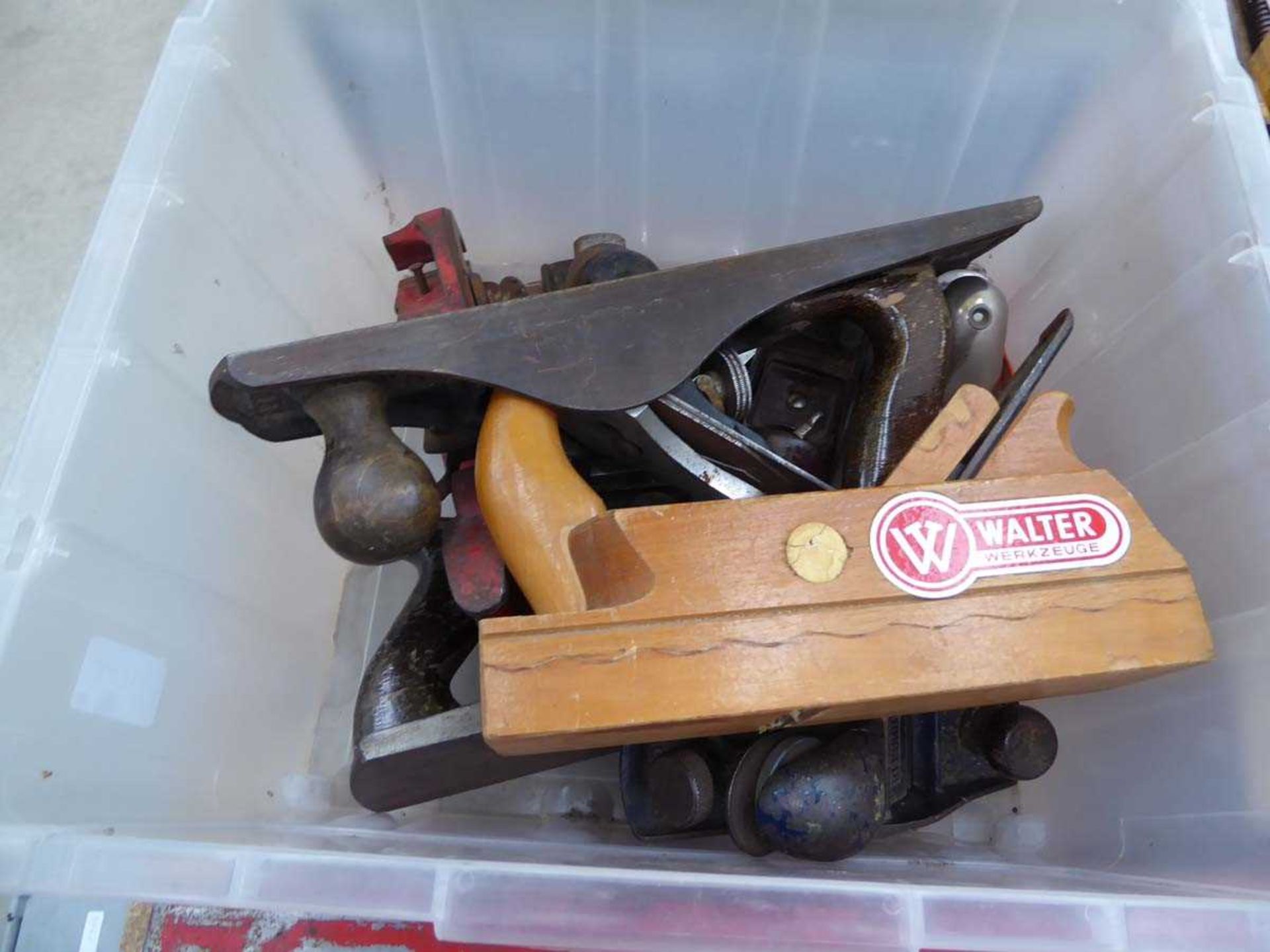 Box containing woodworking planes