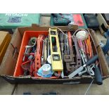 Cardboard box containing assorted tools