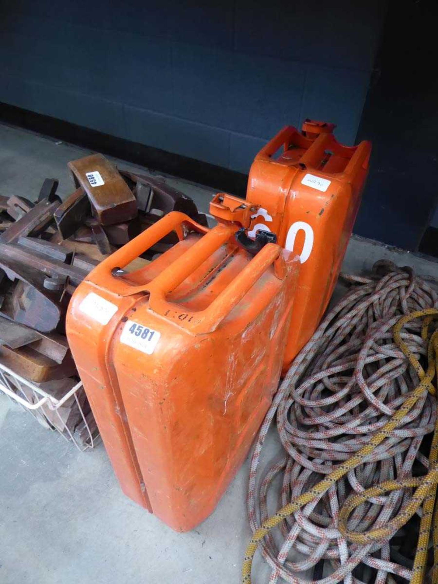 2 orange jerry cans