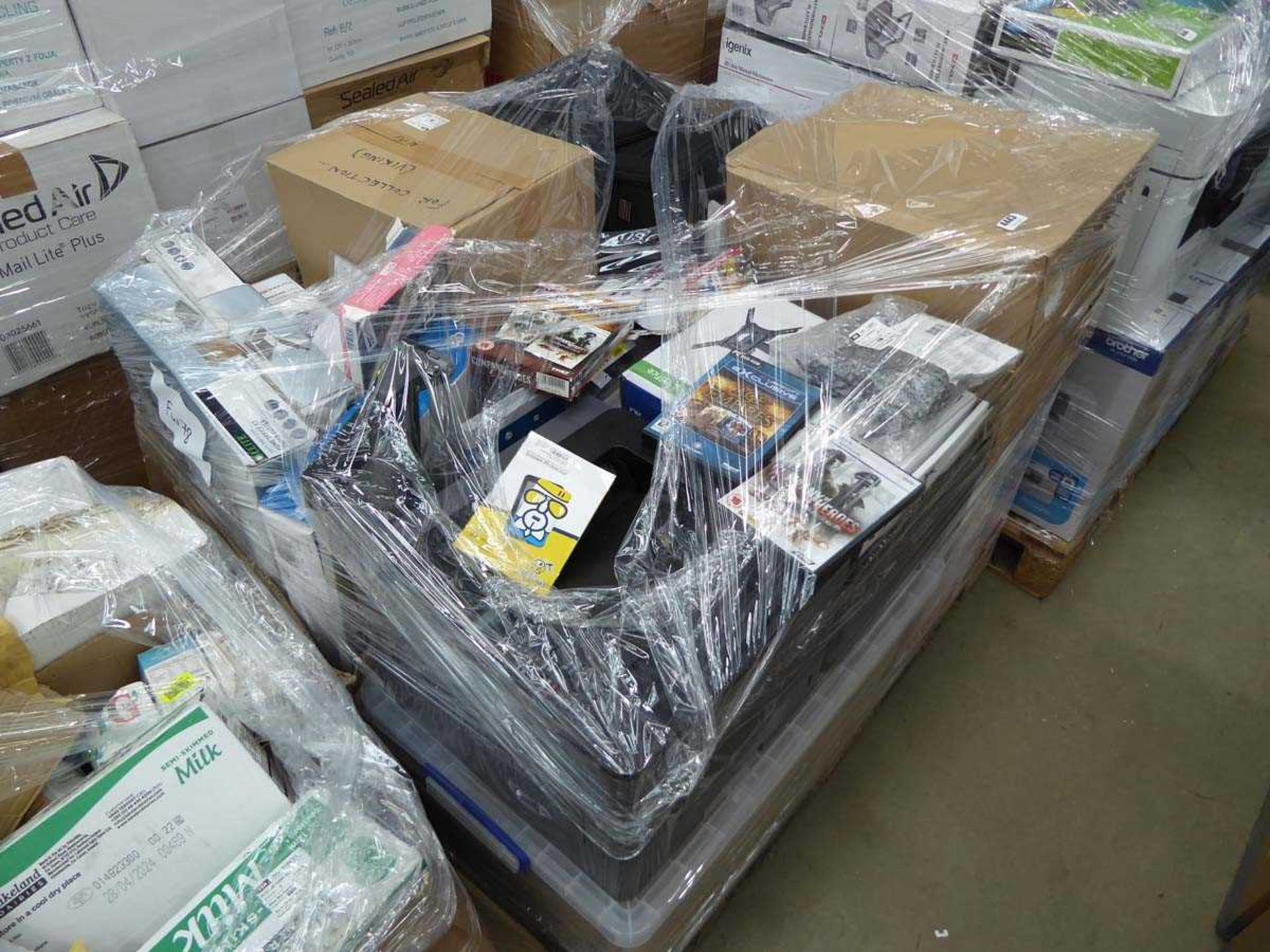 Pallet of assorted items inc. walkie talkies, laptop bags, DVD's, paper cutters etc