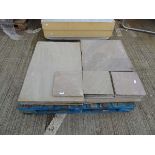 Pallet containing riven paving slabs