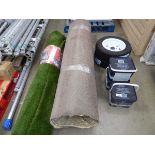 Large roll of brown carpet