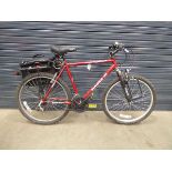 Magna red gents mountain bike with rear rack and pannier