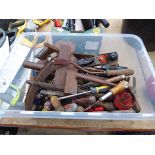 Plastic crate containing assorted tools