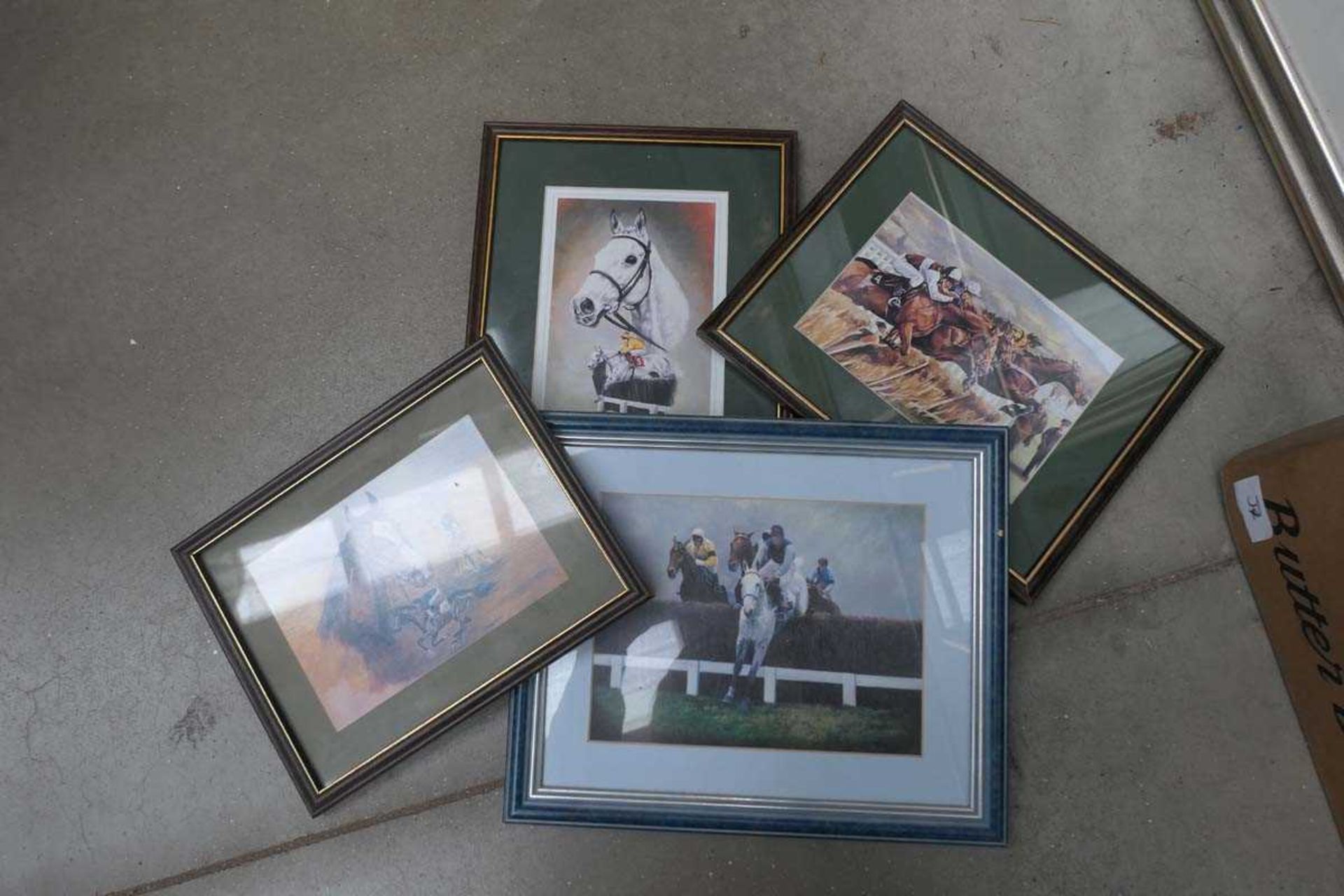 Box containing horse racing related prints