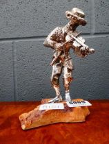 Silver plated figure of 'the musician'
