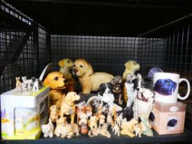 Cage of ornamental dog figures plus mugs