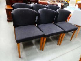 A set of 6 fabric bow back dining chairs