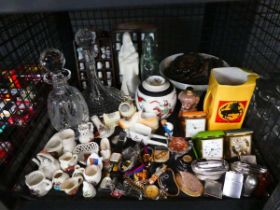 Cage of table lighters, alarm clock, miniature pictures, thimbles, crystal ware, decanters and