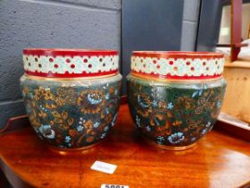 Pair of floral pattern Doulton and Salters pots