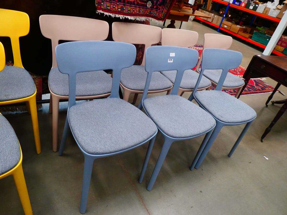 7 moulded plastic dining chairs