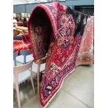 Multicoloured floral and geometric Iranian carpet