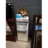 Dome topped mirror in metal frame