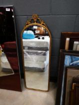 Dome topped mirror in metal frame