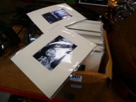 Box containing a collection of Banksy style and other prints