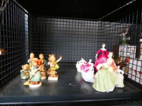 Cage of Hummel and Royal Doulton lady figures