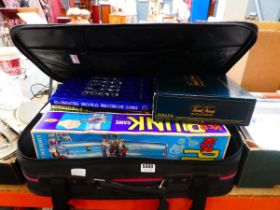 Suitcase with a qty of Guinness Book of Records and board games