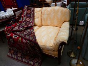 Floral patterned 2 seater sofa with bergere panels