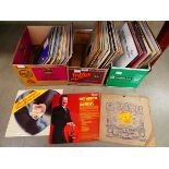 3 boxes containing vinyl records