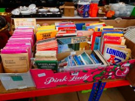 2 boxes containing ordnance survey maps and city guides