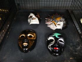 Cage containing 4 Venetian style masks
