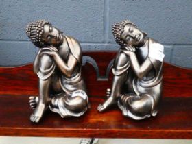 Pair of resin Buddhas