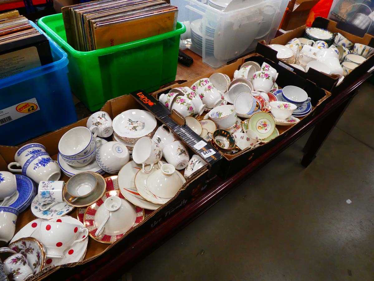 4 boxes containing butterfly and floral patterned crockery