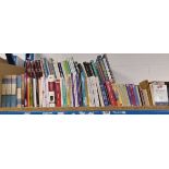 Half shelf of non-fiction and reference books