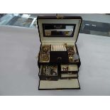 Drawer jewellery box containing various jewellery items