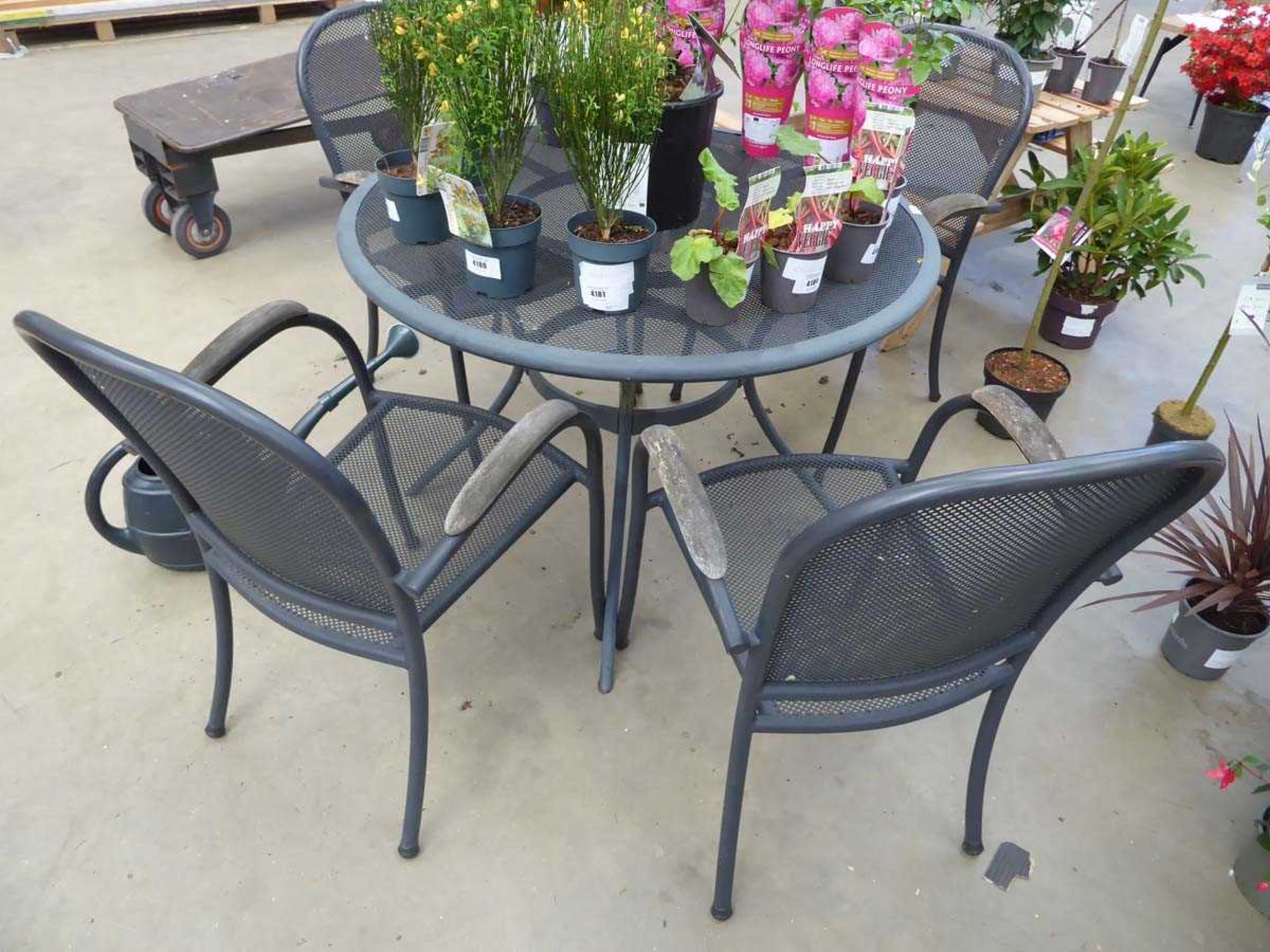 Metal mesh topped garden table and 4 chairs