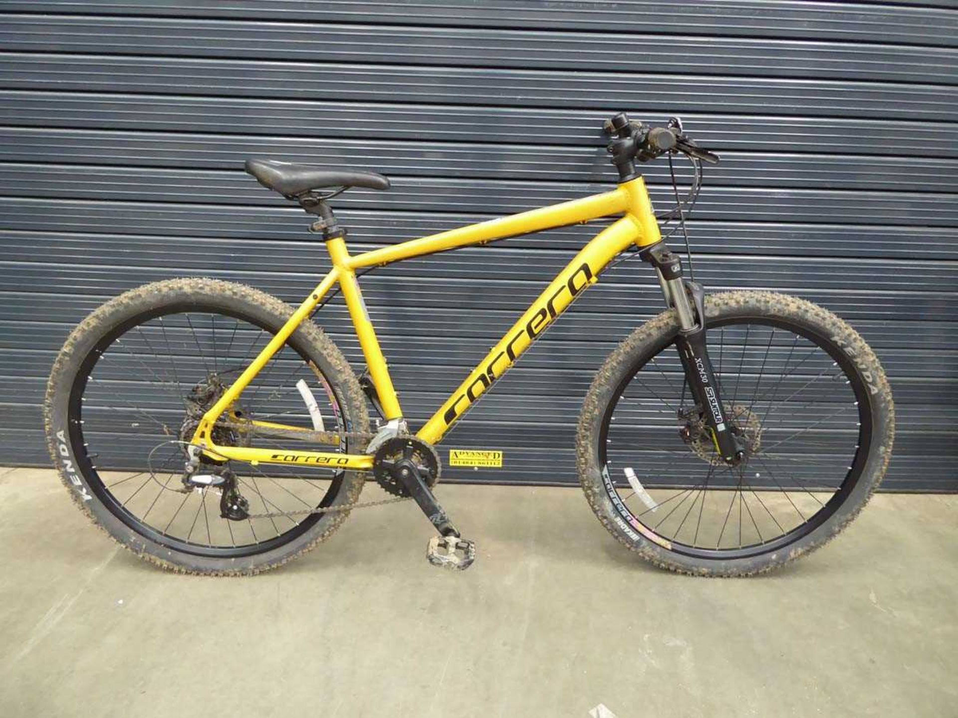 Carrera Vengeance yellow mountain bike