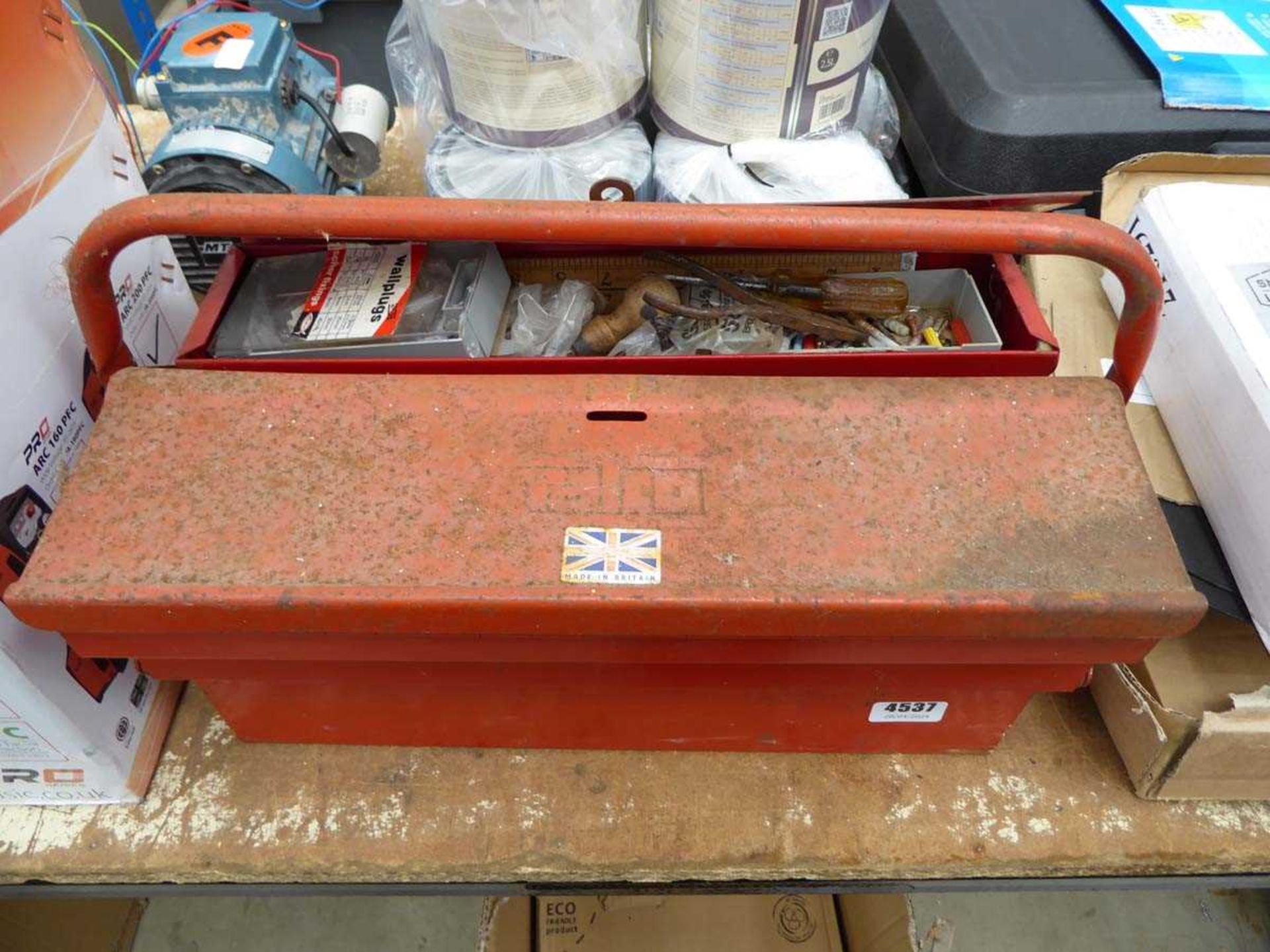 Red cantilever toolbox with various fixings