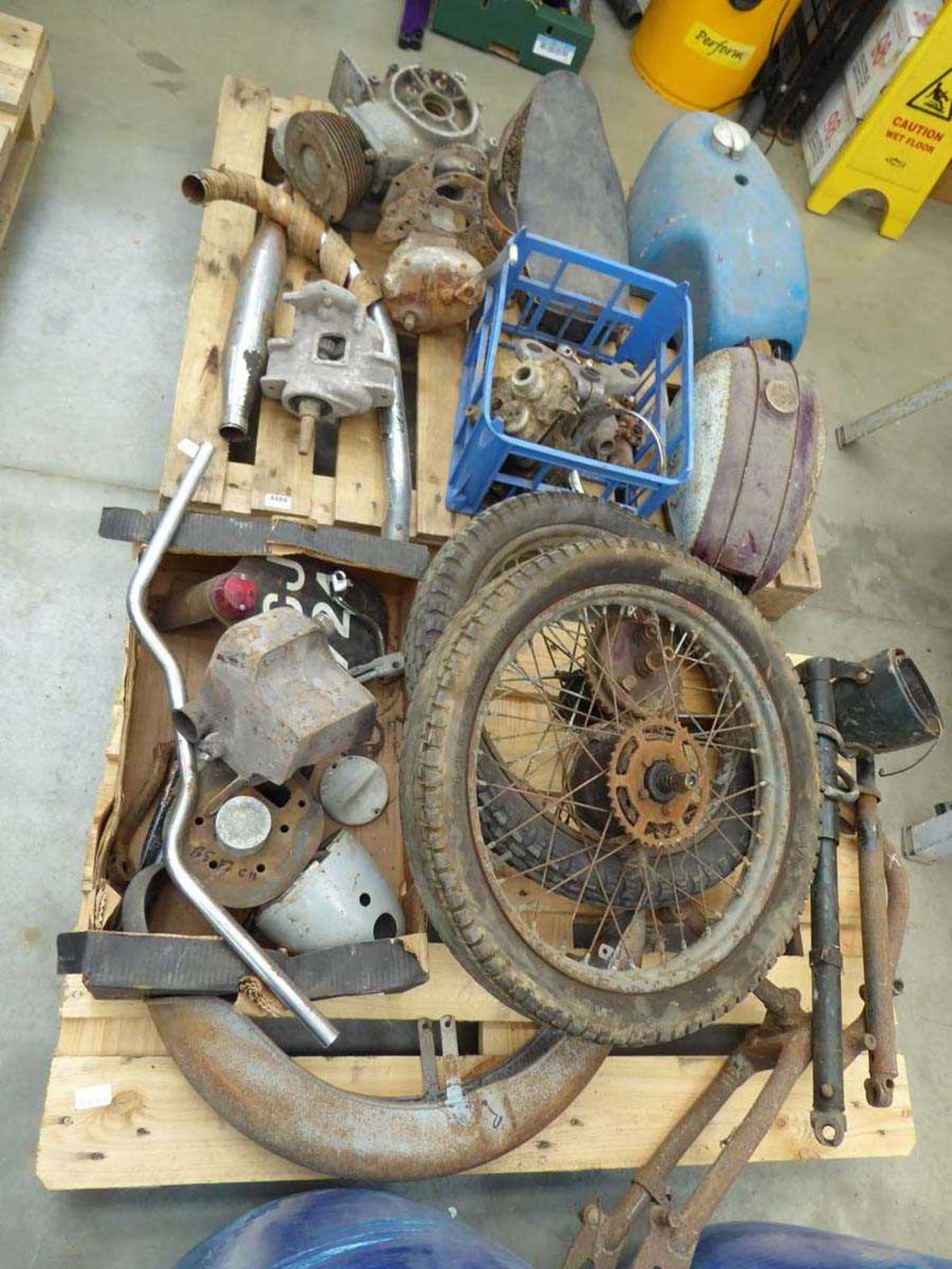 2 pallets of vintage motorcycle spares including wheels, tyres, handlebars, fuel tanks, seats,