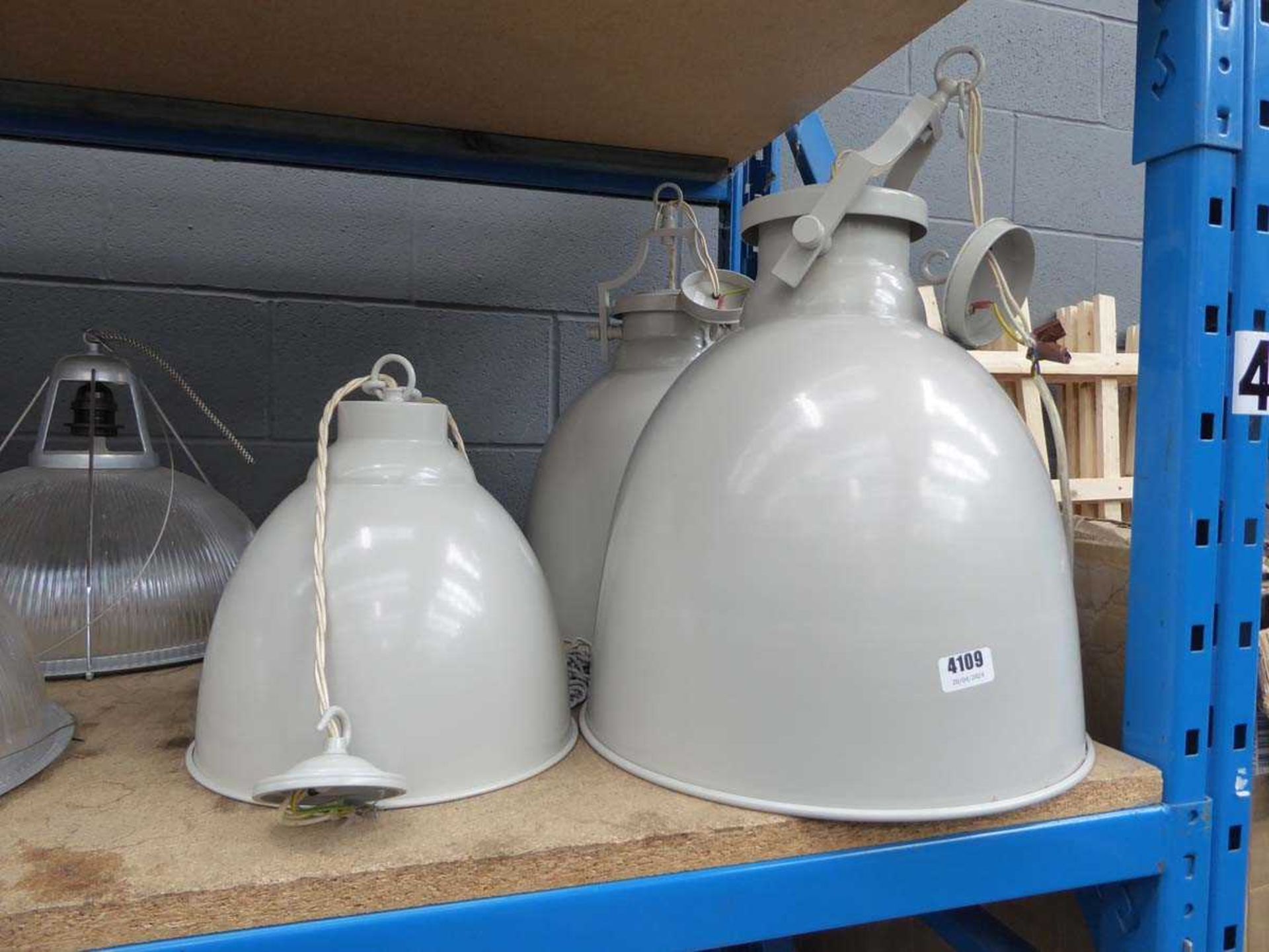 2 large and 2 small grey lamps