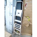 1 cream and 1 silver step ladder