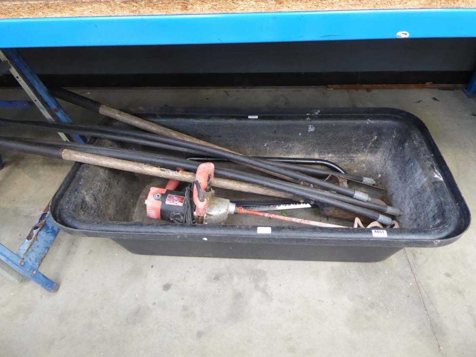 Large builder's trough, plaster mixer, drain rods, and drain shovel