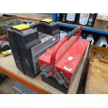 Red cantilever toolbox, and plastic toolbox of various tools and fixings