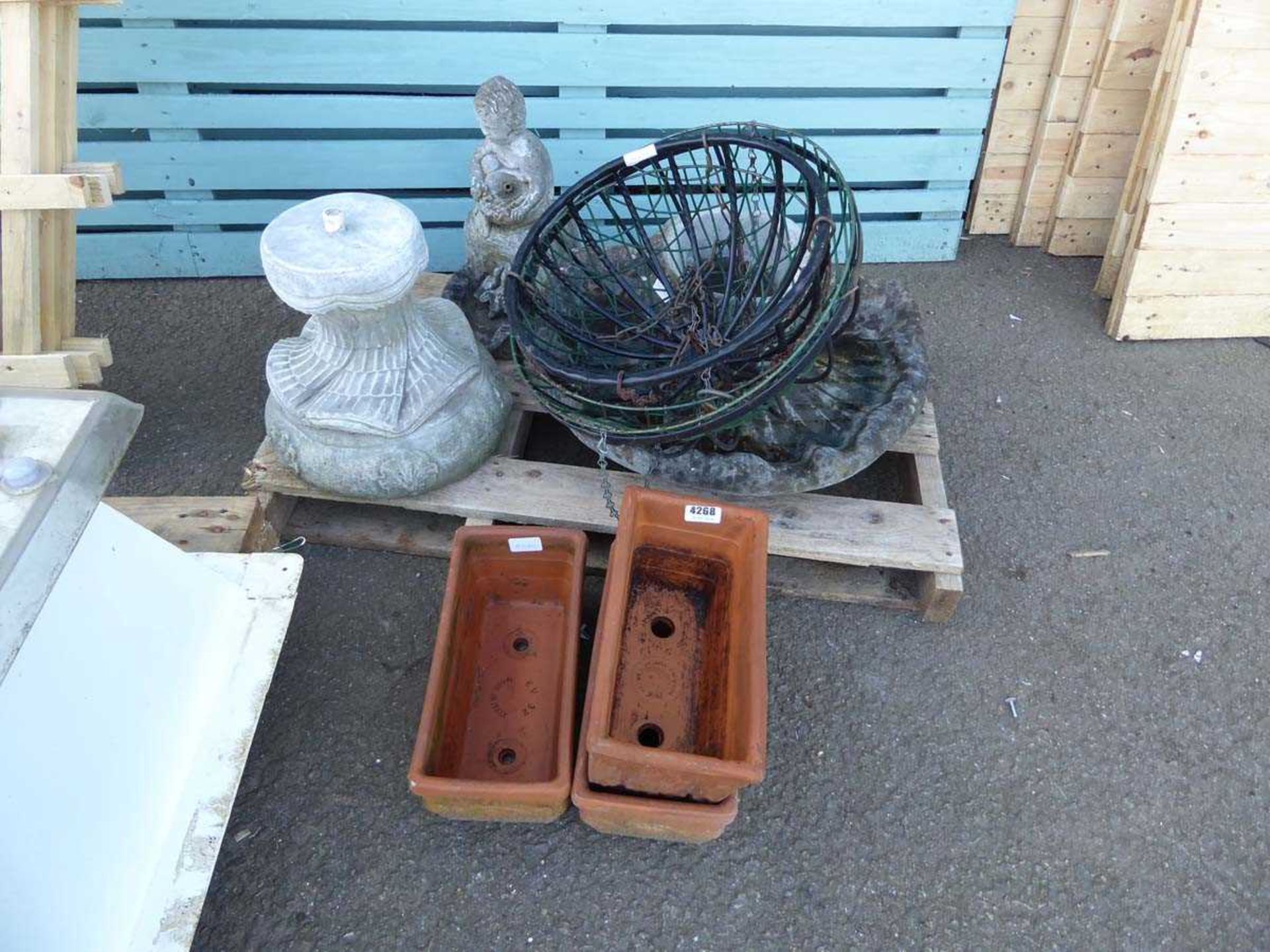 Small pallet containing hanging baskets, bird bath and 3 terracotta pots