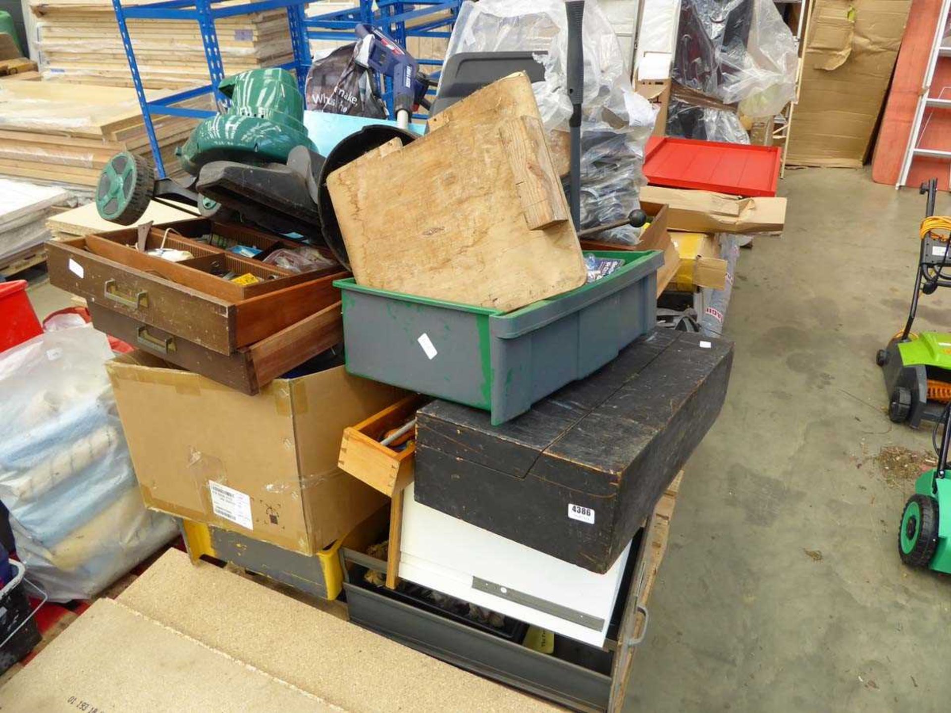 Large pallet of assorted items inc. drills, tools, fixings, strimmer, toolboxes etc.