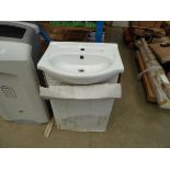 White vanity unit with wash hand basin