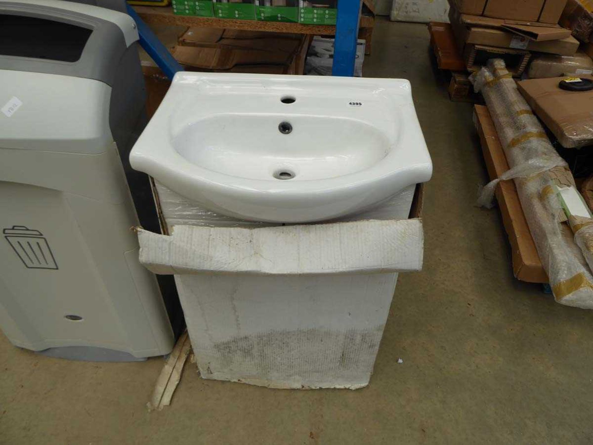 White vanity unit with wash hand basin