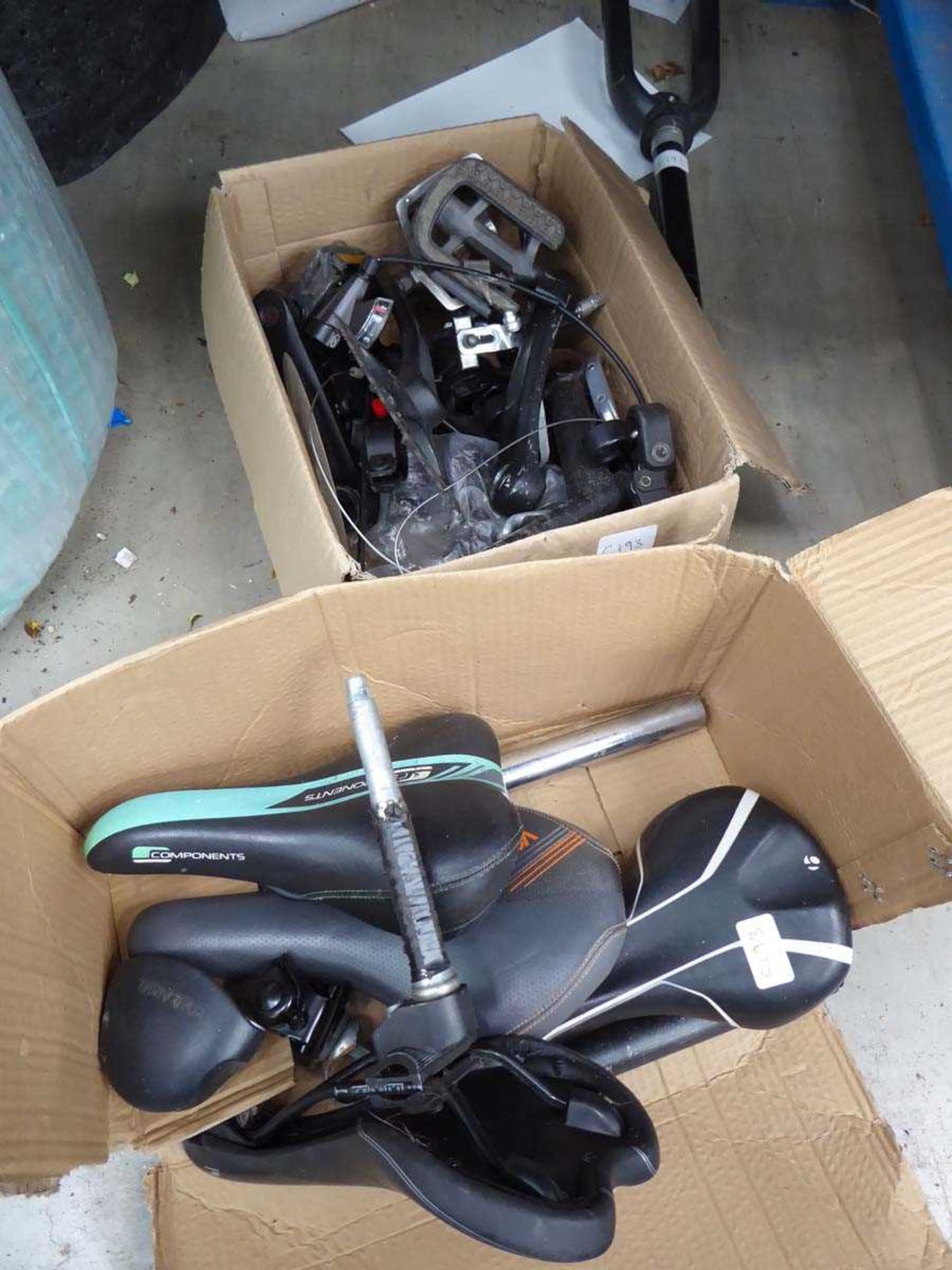 Quantity of used bike parts inc. seat, forks, pedals etc.