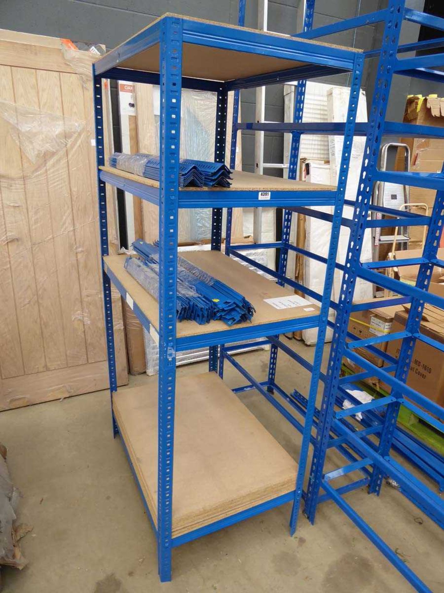 +VAT 1 made-up bay, and 2 flatpack bays of 6ft blue racking with chipboard shelves