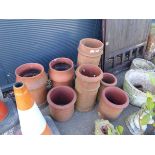 Seven terracotta chimney pots