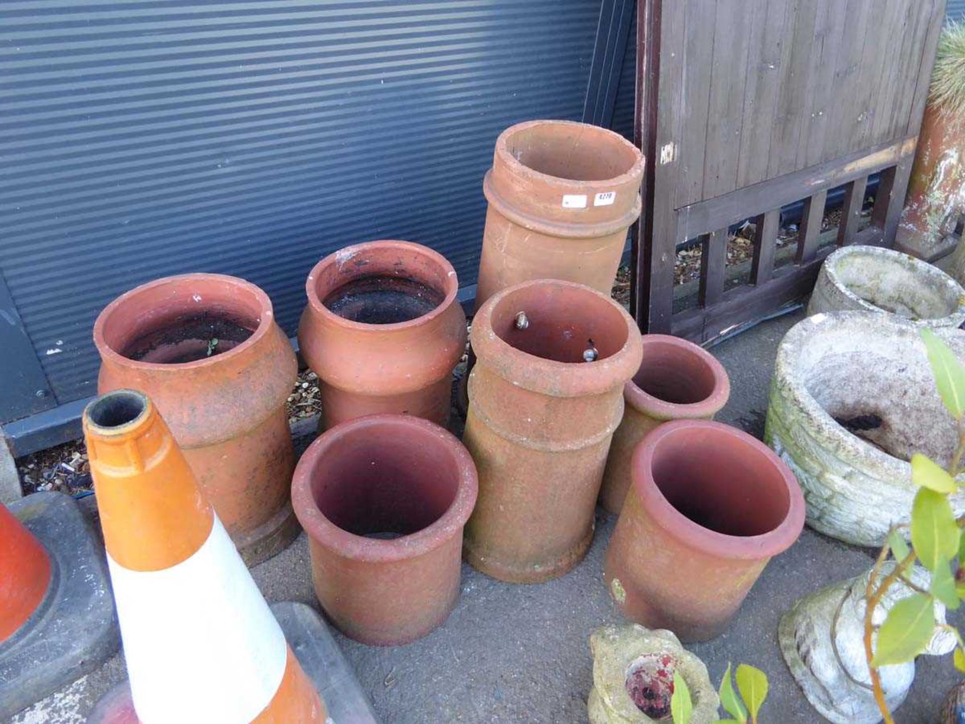 Seven terracotta chimney pots